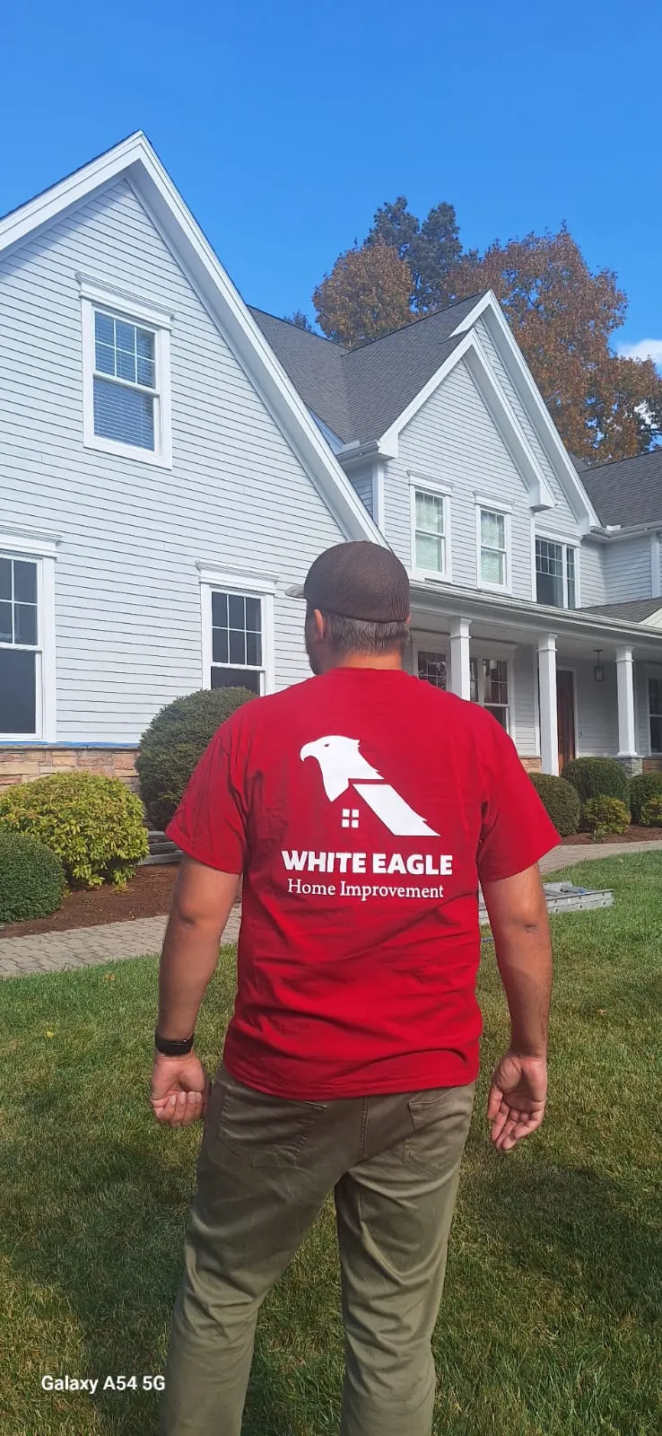 White Eagle crew member repairing a water-damaged ceiling in Central Connecticut