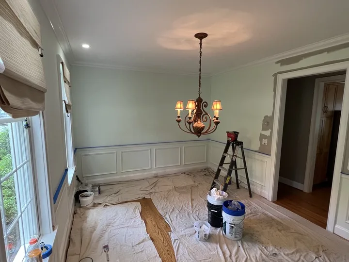 Room fully masked and covered during interior painting prep work
