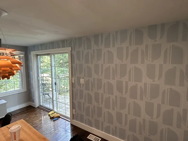 Finished geometric wallpaper accent wall installation in Central Connecticut